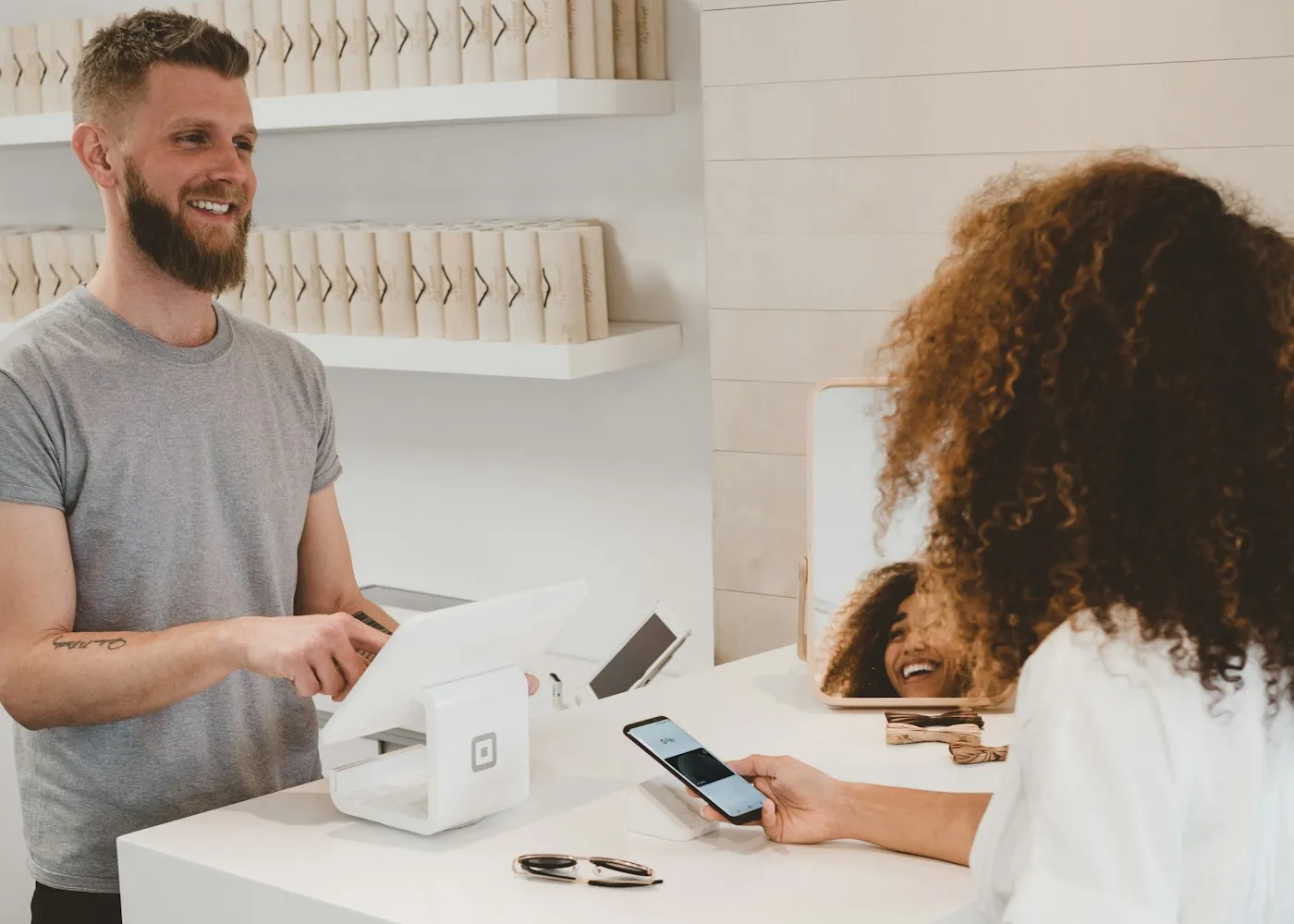 Customer completing checkout in a retail store